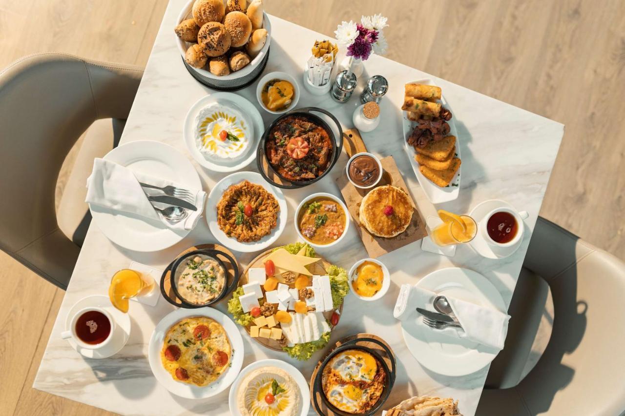 Radisson Blu Hotel, Бурайда Екстериор снимка